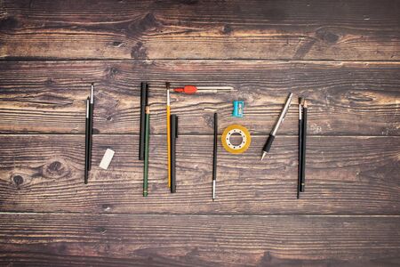 Drawing and office supplies on the desk