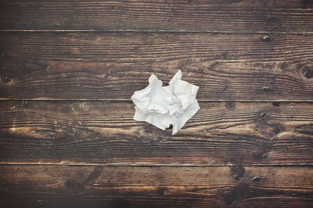 Wrapped paper on wooden tableの写真素材