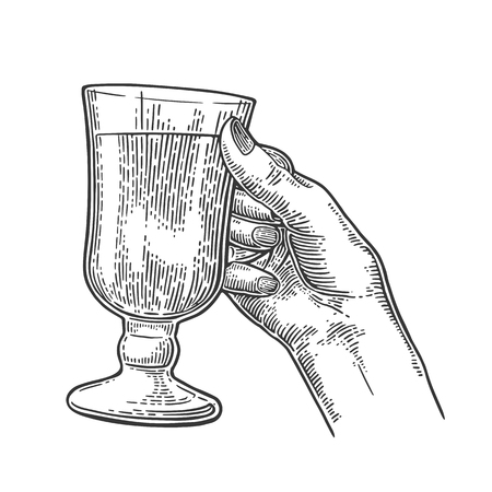 Female hand holding a glass of mulled wine and cocktails. Vintage vector color engraving illustration for label, poster, invitation to a party. Isolated on white background.のイラスト素材