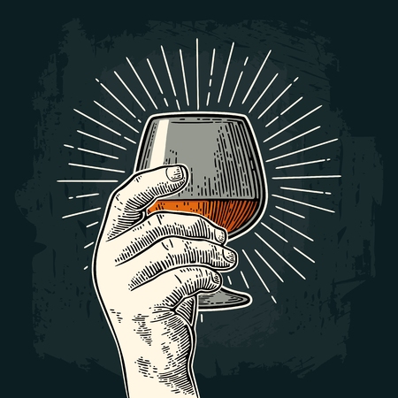 Male hand holding glass brandy with ray. Vintage vector engravingのイラスト素材