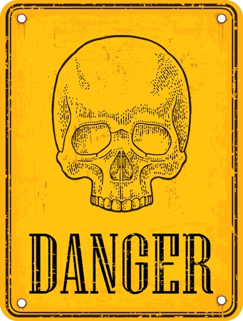 Skull on sign danger. Black vintage vector illustration. For poster and tattoo. Hand drawn design element isolated on yellow backgroundのイラスト素材