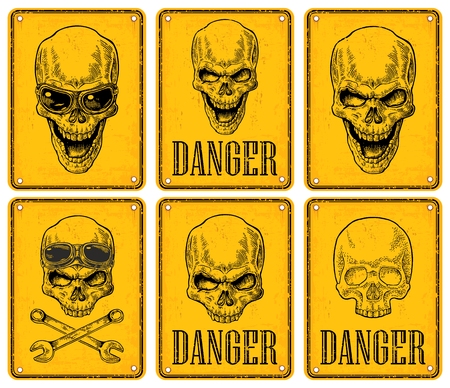 Skulls on sign danger. Black vintage engraving vector illustration. For poster and tattoo. Hand drawn design element isolated on yellow backgroundのイラスト素材
