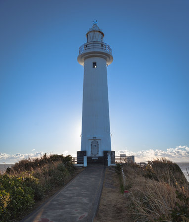 The Tsumekizaki Lighthouse (çªæ¨å´ç¯å°) was built in 1937 and rises 17.32 m (17.32 ft) above ground level and 37.83 m (124.11 ft) above sea level.の写真素材
