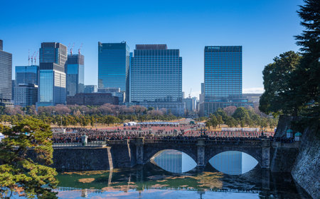 View of Seimon-Ishibashi Bridge and the moat surrounding the Imperial Palace in Tokyo, with the...