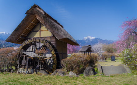 Springtime at Suisha-no-Sato Koen (Waterwheel Village Park) in Hokuto, Yamanashi Prefecture, Japan.の写真素材
