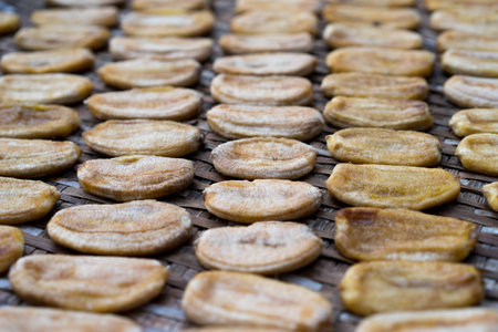 Dried banana on threshing basketの写真素材