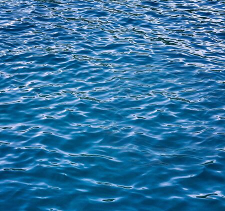 Sea water with waves. Abstract blue water sea for backgroundの写真素材