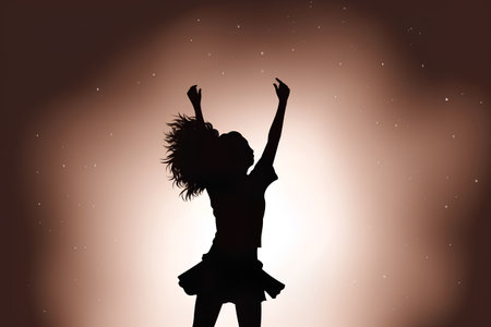 Silhouette of a girl dancing on a starry background.の素材