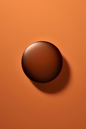 3d rendering of a brown leather ball on an orange background.の素材