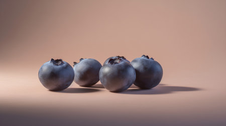Blueberries on a beige background with shadows. 3d renderingの素材