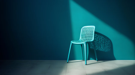 Blue chair in empty room with shadow on wall. 3d renderingの素材
