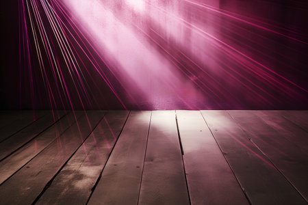 old room with wooden floor and pink rays of light on the wallの素材