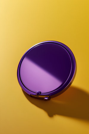 Purple round makeup mirror on a yellow background. 3d renderingの素材