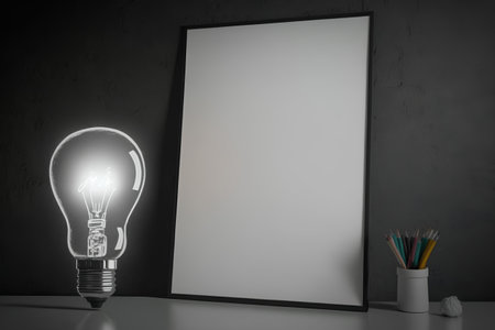 Lightbulb and blank picture frame on black wall, 3d renderの素材