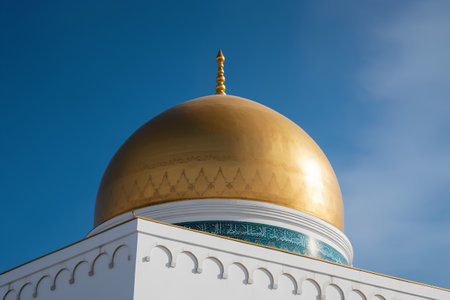 Golden dome of the mosque with blue sky background. 3d renderの素材
