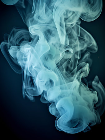 Abstract blue smoke on a black background. Texture. Design element.の素材