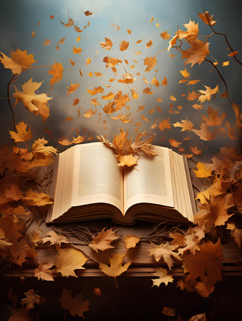 Open book with autumn maple leaves on wooden background. Toned.の素材