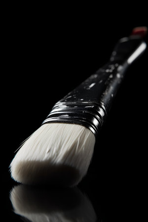 Brush for painting on a black background close-up macro photographyの素材