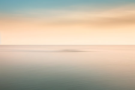 Seascape at sunset with clouds and sky reflected in the waterの素材