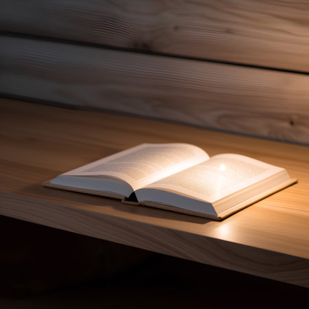 Open book on a wooden shelf in a cozy room. Selective focus.の素材