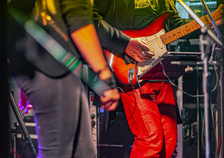 Rock musician at a performance in the village. Photographed in 2020