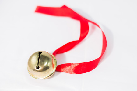 gold bell isolated on white の写真素材