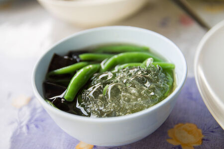 Thai dessert mixed jelly in syrup with iceの写真素材