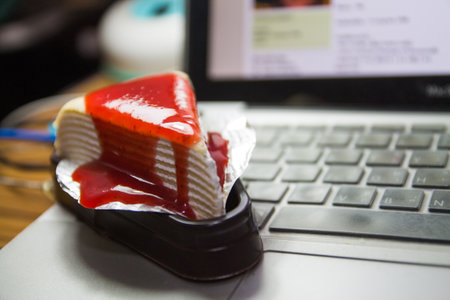 Crepe cake with strawberry sauce on Keybord