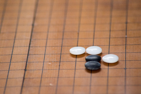 Baduk; Go game black and white stone