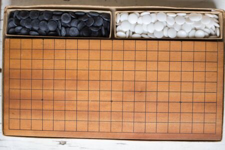 Baduk; Go game black and white stoneの写真素材