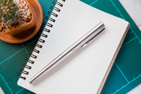 note book with penの写真素材