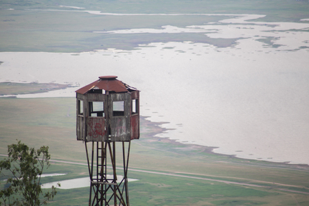 tower old in forest and near damの写真素材