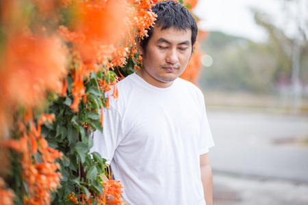 Man with Orange trumpet is which  a flower  bouquet.