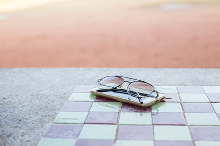 sunglass on smartphoneの写真素材
