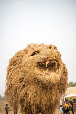 Straw puppet is the lion in a field farmの写真素材