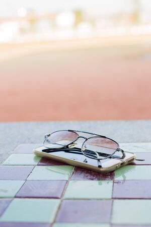 sunglass on smartphoneの写真素材