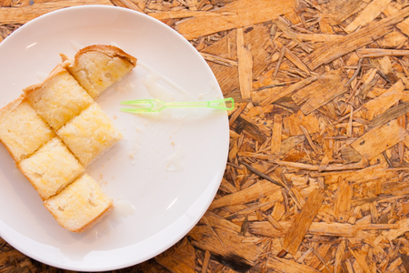 toast bread bake with honey on the plateの写真素材