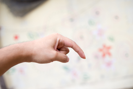 index finger and man's handの写真素材