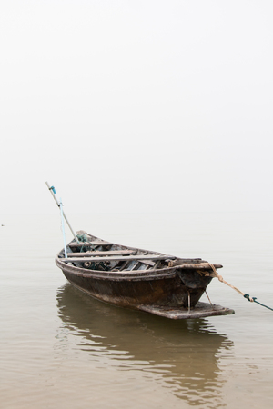 old boat which made from wood on seaの写真素材