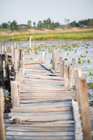 wood bridge cross a riverの写真素材