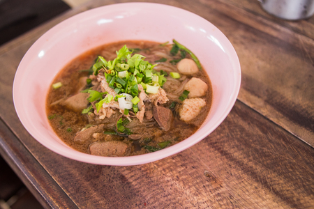 Thai noodle soup on the table.の写真素材