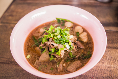 Thai noodle soup on the table.の写真素材