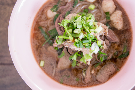 Thai noodle soup on the table.の写真素材