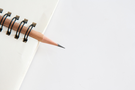 note and  pencilの写真素材