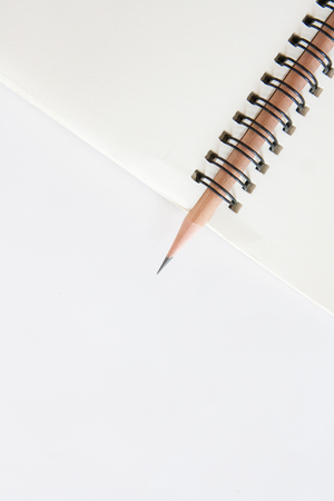 note and  pencilの写真素材