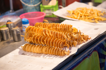 Row potato fried on the table