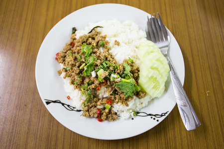 spicy minced meat salad with riceの写真素材