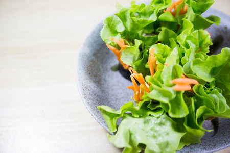 salad row with sea food sourceの写真素材