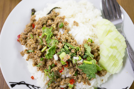 spicy minced meat salad with riceの写真素材