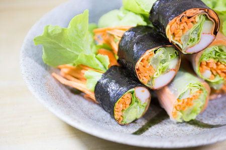 Fresh vegetable salad rolls on the table.の写真素材